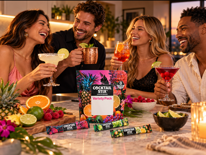 Active adults ages 40–65 enjoying cocktails and mocktails around a stylish patio table, with Cocktail Stix packets visible.